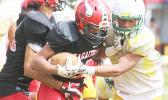 Faga’itua Vikings’ Scott Pese is stopped 