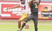 Calloway Alosio (3) of the Nu’uuli Wildcats going up for a grab
