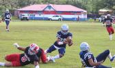 Johnson Talauega intercepting a pass from Fitu Amata of