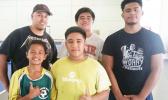 Aspiring wrestlers from around the territory were at the DYWA Pago Pago Community Youth Center yesterday morning to take advantage of the free wrestling clinics being conducted by Alex Ramirez (back row far left), an educator and high school wrestling coach from southern California.  [photo: Blue Chen-Fruean]
