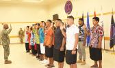 7 American Samoa young men and women during the swearing in ceremon