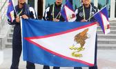 Team AS Wrestlers, Iafeta Vou, Danieal Misaalefua, Nolan Puletasi with the American Samoa Flag on their way over to the wrestling arena for the first matches of the day. Puletasi and Misaalefua were able to advance to wrestle for the bronze medal in their respective categories but both lost in the end. (Photo: Terry Custodio Auva'a)