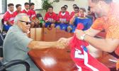 American Samoa Baseball Association president, Marcus Langkilde presented Gov. Lolo Matalasi Moliga with team jersey.