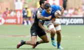 Gordon Langkilde is tackled during a World Series match against New Zealand