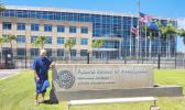 Governor Pulaali’i in front of fbi office in Honolulu