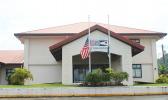 Flags at half staff in front of election office