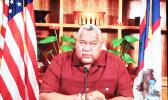 Gov. Lemanu Peleti Mauga at desk during virtual testimony