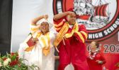 Two graduates celebrating
