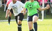 A Green Bay player controls the ball against Ilaoa & To’omata 