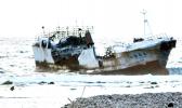 This photo taken Tuesday and provided by a local resident to Samoa News, shows the fishing vessel, Chui Zai Fa No. 1 just off the Leone village coast line.  The vessel has caused concern to local residents, who have noted a possible oil spill and damage to the reef, especially in the last two days of rough tides and strong winds. Samoa News understands some villagers have also complained of a ‘smell’ in the air, since the vessel showed up on their reef.  The US Coast Guard is sending a team from Hawai’i and