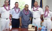 Gov. Lolo Matalasi Moliga (center) with Commander Andy Strickland, Commanding Officer of the USS Shoup; two Naval officers and a US Coast Guard official