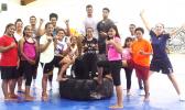 Gymnastics Australia Oceania development manager Brooke Kneebush (far right) with some of the local youngsters she worked with during a recent trip to the territory.  [photo: courtesy]