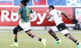 Rosko Specman #11 of South Africa outruns Jerry Tuwai #9 of Fiji to score during the Cup Final match between South Africa and Fiji at the HSBC Rugby Sevens Series held in Sam Boyd Stadium March 3-5, 2017. Final score:  South Africa-19, Fiji-12. (Photo by Allan Hamilton/ Calibre Sports Photomedia)