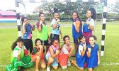 Youngsters with handball players after a handball fun program