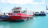 Hawaii fishing boats at Pier 22 in Honolulu.