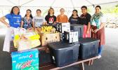 Many of the volunteers who put the care packages together