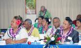 Samoa’s National Health Services General Manager Tupuimatagi Palanitina Toelupe (left) and Pastor Leonard Solomona, Founder of First-Touch Ministry Boot Camp of Samoa, along with members of the Samoa delegation (in the background) at yesterday’s opening of the three-day 7th Bilateral Health Summit of the two Samoas hosted by American Samoa at the Gov. H. Rex Lee Auditorium.  [photo: AF]