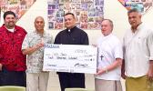 [l-r] Moepologa John Pereira, general manager of Molida Shipping Agency, American Samoa; Lanu Pen, Matson American Samoa representative; Dean Matsuoka, sales account executive of Matson Hawaii; Rev. Father Faitau Lemautu, Hope House chaplain; Bishop Peter H. Brown; Ta'afano Joe Tavale, Hope House board chairman; and Larry Sanitoa, chairman of the Hope House fundraising committee 