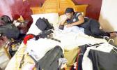 Jamica Batts sits on a hotel bed with her two-month-old baby Jarasiah Batts as they pack to leave Monday, Sept. 4, 2017, in Houston. Batts and her brother Alvin may now be forced to go from the hotel they have been staying in after Hurricane Harvey, to an area shelter. (AP Photo/Gregory Bull) Jamica Batts sits on a hotel bed with her two-month-old baby Jarasiah Batts as they pack to leave Monday, Sept. 4, 2017, in Houston. Batts and her brother Alvin may now be forced to go from the hotel they have been staying in after Hurricane Harvey, to an area shelter. (AP Photo/Gregory Bull)