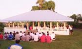 Members of the village of Falefa present a traditional Samoan ifoga 