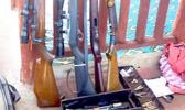 uns and bullets taken from a Police raid 
