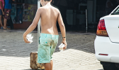 Child vendor on a street in Apia