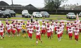 Faga’itua Vikings Football Team running towards the sidelines 