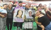 Family celebrating their grad
