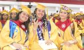 Rose Fiame (right) and Aooatua Fanene (center), along with Salutatorian Alexis Tuiasosopo (left)