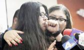 Marlene Mosqueda, left, who's father was arrested by ICE early Friday morning to be deported, is comforted at a news conference by her attorney Karla Navarrette at The Coalition for Humane Immigrant Rights of Los Angeles (CHIRLA) on Friday, Feb. 10, 2017. Navarrete, said she sought to stop Mosqueda from being placed on a bus to Mexico and was told by ICE that things had changed. She said another lawyer filed federal court papers to halt his removal. (AP Photo/Nick Ut) Marlene Mosqueda, left, who's father was arrested by ICE early Friday morning to be deported, is comforted at a news conference by her attorney Karla Navarrette at The Coalition for Humane Immigrant Rights of Los Angeles (CHIRLA) on Friday, Feb. 10, 2017. Navarrete, said she sought to stop Mosqueda from being placed on a bus to Mexico and was told by ICE that things had changed. She said another lawyer filed federal court papers to halt his removal. (AP Photo/Nick Ut)