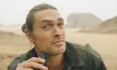 Jason Momoa shaving his beard.