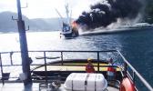 The crew of the tug Iseula tows to the 228-foot commercial fishing vessel Jeanette from the port of Pago Pago