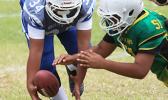 JPS Sharks punter trying to gain possession of a bad snap