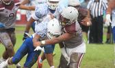 Marcus Samia hit hard by a Warrior defender