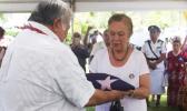 HONORING SERVICE TO SAMOA: Prime Minister Tuilaepa Dr. Sa'ilele Malielegaoi presents the flag of Samoa to Celine Keil during the funeral of Hans Joachim Keil at Lotopa. (Photo: Deidre Fanene) uilaepa Dr. Sa'ilele Malielegaoi presents the flag of Samoa to Celine Keil