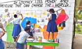 Pava’ia’i Elementary School students at work on their mural.