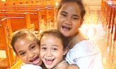 3 laughing and joyful young girls