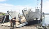 A landing craft being used for commercial purposes