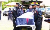 American Samoa flag draped casket of the late former Sen. Tulifua Tini Lam Yuen with police escorte
