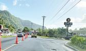Traffic cones on road in from of CBT and Laufou