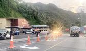Traffic cones blocking left turn into CBT parking lot