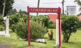 Eighteen families of Leauva’a were ordered to vacate land they had occupied for years are appealing the decision from the Land and Titles Court. (Photo: Misiona Simo) Leauva’a village sign