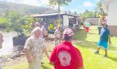 Leone chiefs inspecting homes in the village