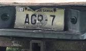 The license plate of the Department of Agriculture vehicle 