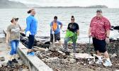 Homeland Security staffers at Lions Park clean up