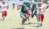Alex Faiivae (11) of the Leone Lions returning this punt all the way to the end zone