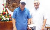 Gov. Lolo Matalasi Moliga in a photo from Tuesday, July 23, 2019 with Monsignor Viane Etuale