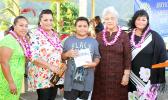Eleven-year-old Malakai Seva’aetasi with his grandmother, the First Lady and  One Global Family co-founder and her daughter