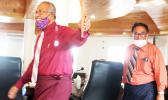 ASG Treasurer Malemo L. Tausaga (front) and LBJ Medical Center chief executive officer Faumuina John Faumuina