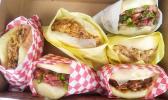  A box of tacopuas, a blend of Hawaiian and Samoan food, at Taste of Samoa Manapua Bakery in Parkland. [Sue Kidd skidd@thenewstribune.com]